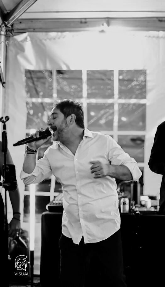 Lead Singer of Fotia Live performing at the Andover Sts Constantine and Helen Greek Festival